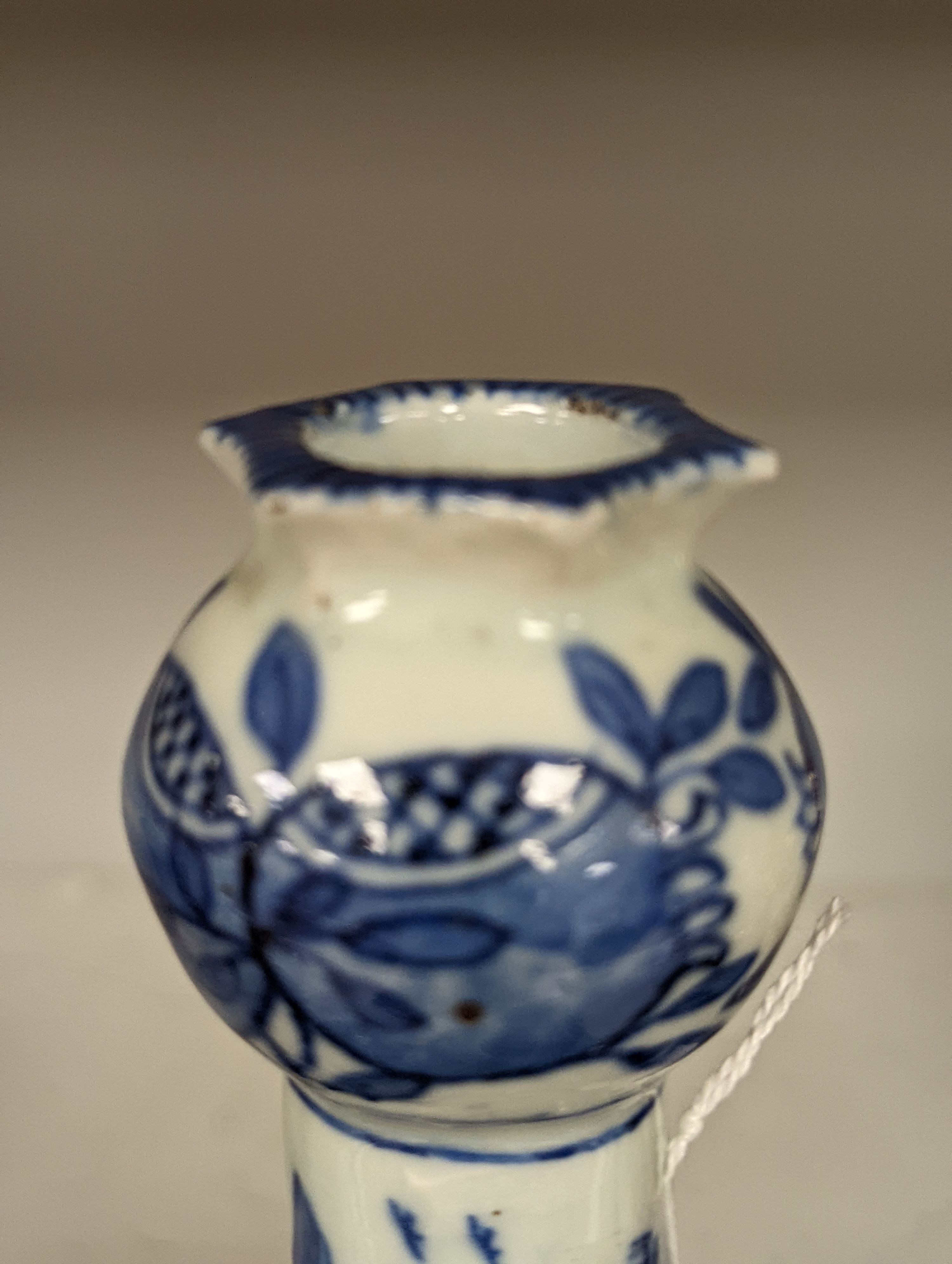 A 19th century Chinese blue and white tulip vase, painted with the pavilion of Prince Teng - 24cm high